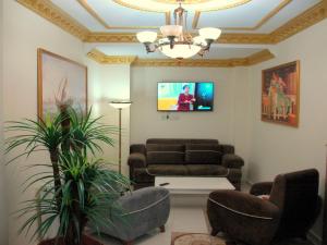 TV a/nebo společenská místnost v ubytování Tolga Hotel