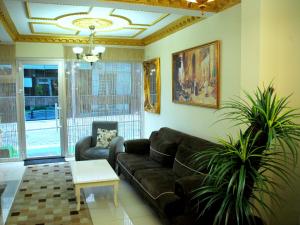 Posezení v ubytování Tolga Hotel