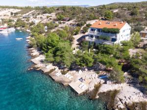 an aerial view of a resort next to the water at Apartments Perfect place in Hvar
