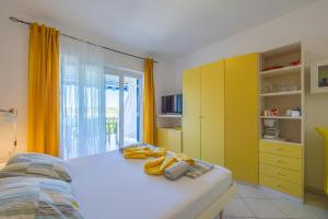 Posteľ alebo postele v izbe v ubytovaní Apartments Perfect place