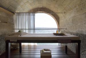A bed or beds in a room at Hospes Maricel y Spa, Palma de Mallorca, a Member of Design Hotels
