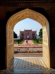 an archway with a building in the background at Aradhanas Home Stay Near Taj Mahal in Agra