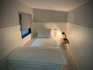 Postel nebo postele na pokoji v ubytování Island House Rentals 26