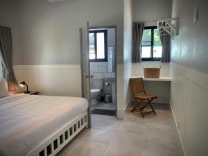 Postel nebo postele na pokoji v ubytování Island House Rentals 26