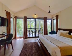 Postel nebo postele na pokoji v ubytování Willow Resorts Wayanad