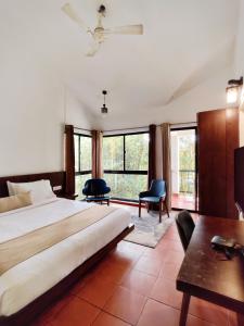 Postel nebo postele na pokoji v ubytování Willow Resorts Wayanad