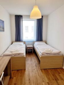 Postel nebo postele na pokoji v ubytování Stylish apartment in Mitte Berlin 24