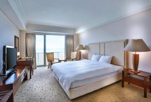 Televizors / izklaižu centrs naktsmītnē Hotel Hyundai by Lahan Mokpo