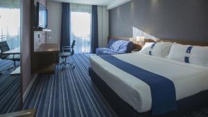 Posteľ alebo postele v izbe v ubytovaní GP Hotel