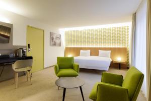 Postel nebo postele na pokoji v ubytování ibis Styles Kortrijk Expo + 37 fotografií