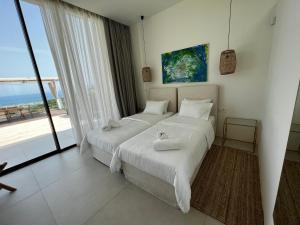 Postel nebo postele na pokoji v ubytování Ellas Residence fantastic pool heated + 89 fotografií