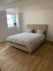 Cama o camas de una habitación en T3 neuf - maison alsacienne au calme avec cour privée