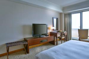 Televizors / izklaižu centrs naktsmītnē Hotel Hyundai by Lahan Mokpo
