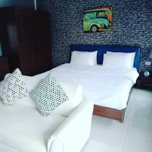 Кровать или кровати в номере Nakhamvilla