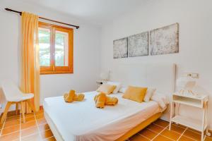 Posteľ alebo postele v izbe v ubytovaní Finca LA CASETA Pollensa by Mallorca Villa Selection