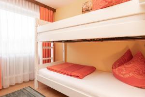 Łóżko lub łóżka w pokoju w obiekcie Appartement Imelda