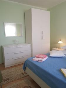 Posteľ alebo postele v izbe v ubytovaní 2B Apartment