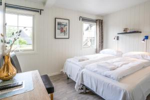 Postel nebo postele na pokoji v ubytování Topcamp Havblikk - Helgeland