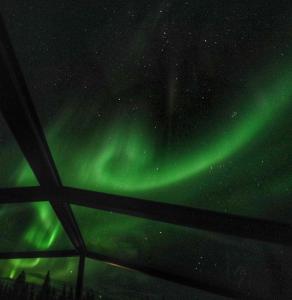 an image of the northern lights in the sky at Levillas Utsunkulma 10B in Levi