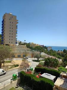 a view of a city street with a tall building at Apartment Mar Augusta in Calpe