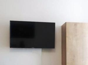 TV a/nebo společenská místnost v ubytování Hotel Garni Villa Areka