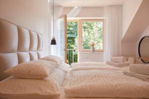 Postel nebo postele na pokoji v ubytování Apartmány Lipno Přední Výtoň