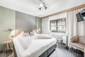 Posteľ alebo postele v izbe v ubytovaní Corso`s Annabell - Bed & Breakfast