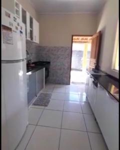 Kuchyň nebo kuchyňský kout v ubytování Casa de férias Amarela em Prado + 4 fotografie