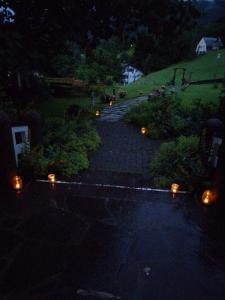 an overhead view of a garden at night with lights at Landhaus Schönblick in Bad Kohlgrub