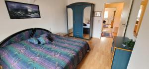 Postel nebo postele na pokoji v ubytování Ferienwohnung Vennen