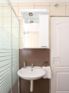 Vonios kambarys apgyvendinimo įstaigoje Apartman Maja
