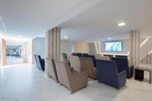 TV a/nebo společenská místnost v ubytování Gran Hotel Las Fuentes