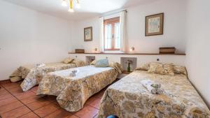 Posteľ alebo postele v izbe v ubytovaní El Olivo de Burbunera Rute by Ruralidays + 27 fotografií