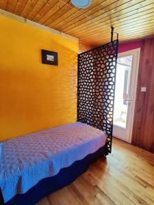 Posteľ alebo postele v izbe v ubytovaní Chalet Ailleurs Appartement à Molines en Queyras