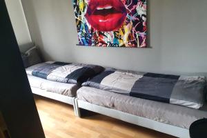 Ένα ή περισσότερα κρεβάτια σε δωμάτιο στο Work & stay apartment with balcony near Ingolstadt