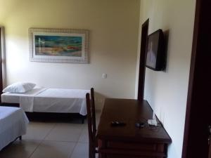 Voodi või voodid majutusasutuse Residencial Seestern - Suítes toas