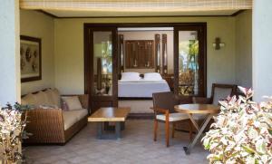 Krevet ili kreveti u jedinici u okviru objekta Paradis Beachcomber Golf Resort & Spa