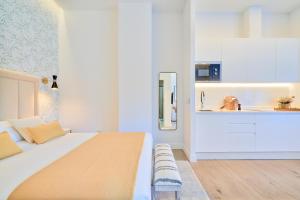 Posteľ alebo postele v izbe v ubytovaní Lofts Parque de Huelin