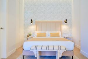 Posteľ alebo postele v izbe v ubytovaní Lofts Parque de Huelin
