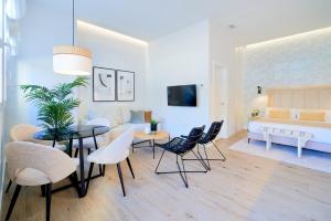 Posteľ alebo postele v izbe v ubytovaní Lofts Parque de Huelin