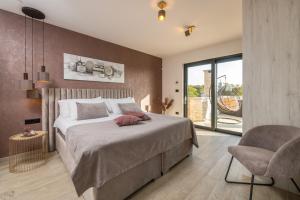 Postel nebo postele na pokoji v ubytování Villa Memory + 37 fotografií