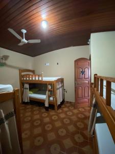 Postel nebo postele na pokoji v ubytování Hostel Roraima