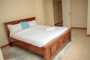 Voodi või voodid majutusasutuse Zoe Homes 3br Mansionette Own Compound Kericho town near Green Square mall toas