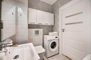 Kúpeľňa v ubytovaní Develia Mała Praga Charming Studio
