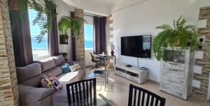 TV a/nebo společenská místnost v ubytování Apartment 2-10 Canteras Beach
