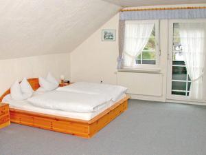 Voodi või voodid majutusasutuse Hotel-Restaurant Zum Dorfkrug toas