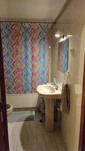 a bathroom with a sink and a toilet and a shower at Asia in Alcalá de Henares