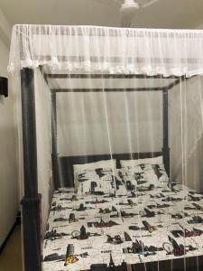 Postel nebo postele na pokoji v ubytování Amor Place Unawatuna