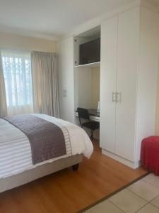 Ένα ή περισσότερα κρεβάτια σε δωμάτιο στο Buliso Homestay