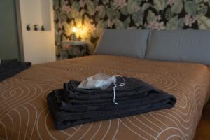 Posteľ alebo postele v izbe v ubytovaní Piazza San Secondo-Dimora con terrazza- Wi-Fi e Ac